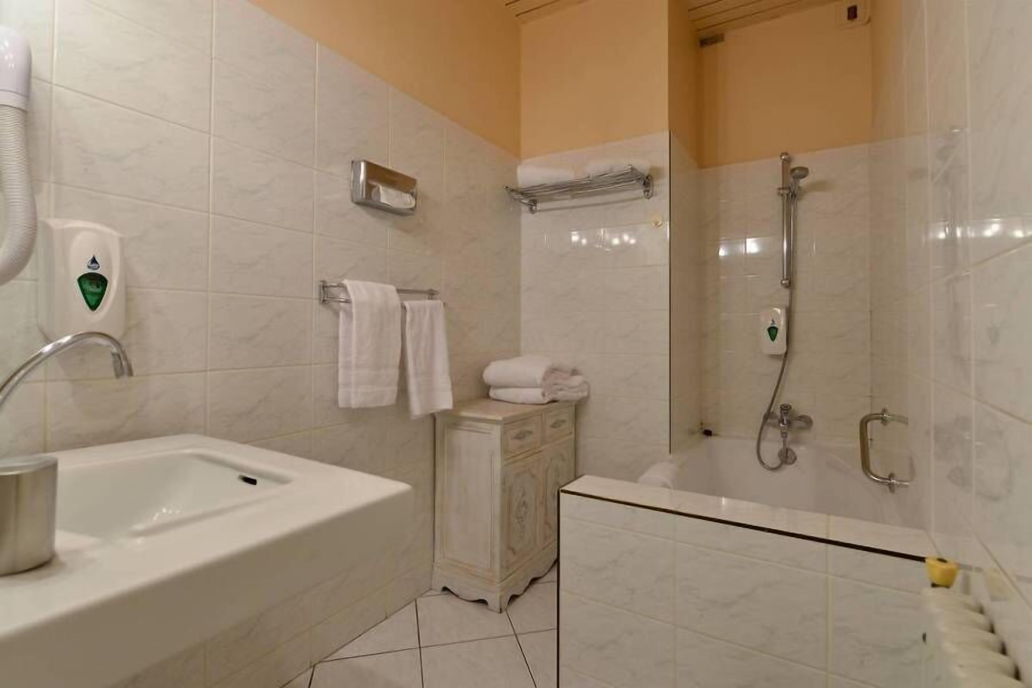 eco-friendly toiletries, hair dryer, bathrobes, towels