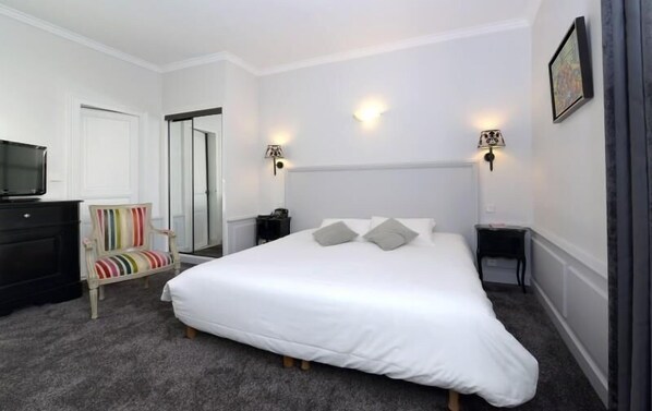 Minibar, in-room safe, individually decorated, desk