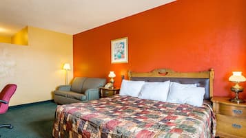 Desk, iron/ironing board, bed sheets
