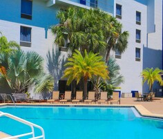 Premium bedding, down comforters, pillowtop beds, in-room safe