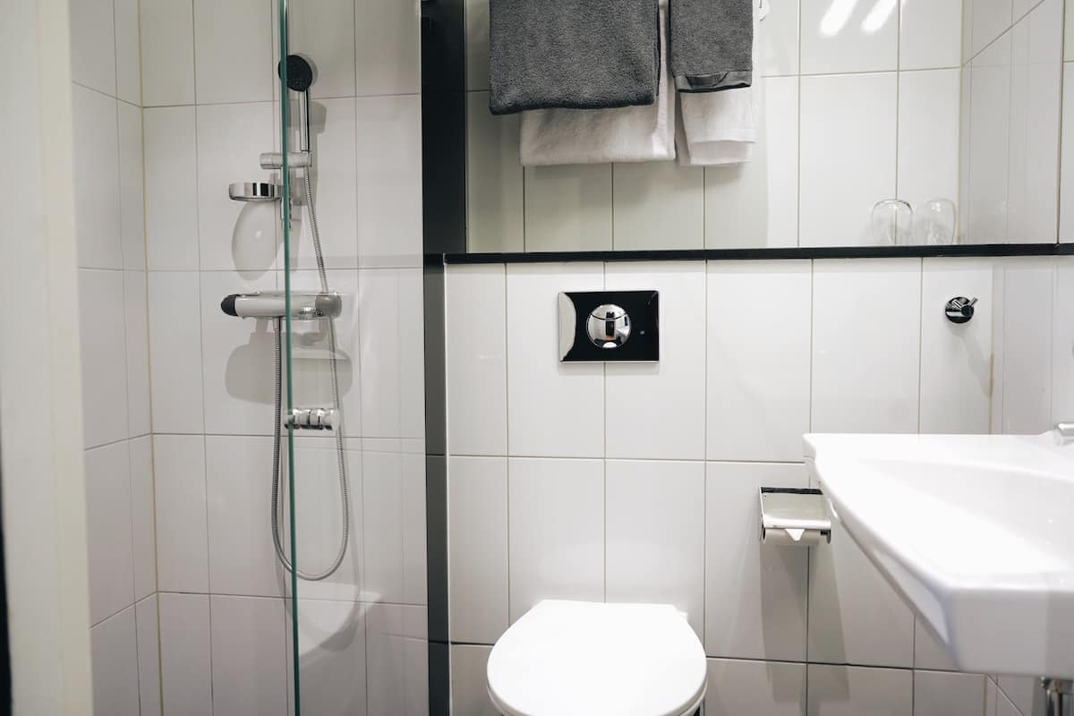 double room (compact) | bathroom | hair dryer, towels, soap, shampoo