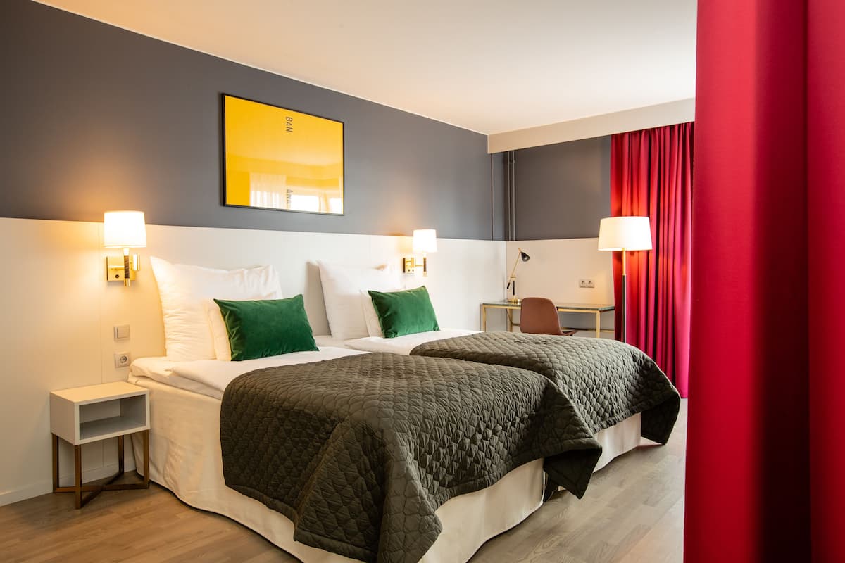 in-room safe, desk, blackout curtains, iron/ironing board