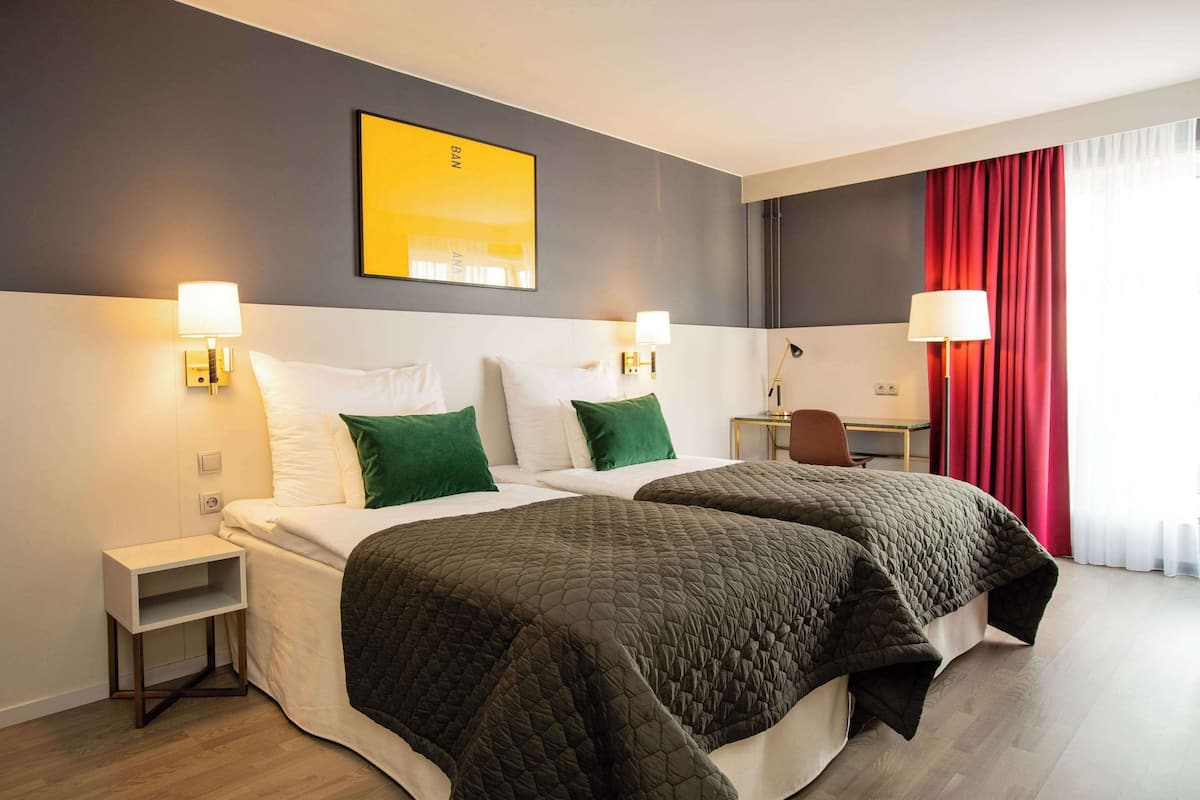 in-room safe, desk, blackout curtains, iron/ironing board