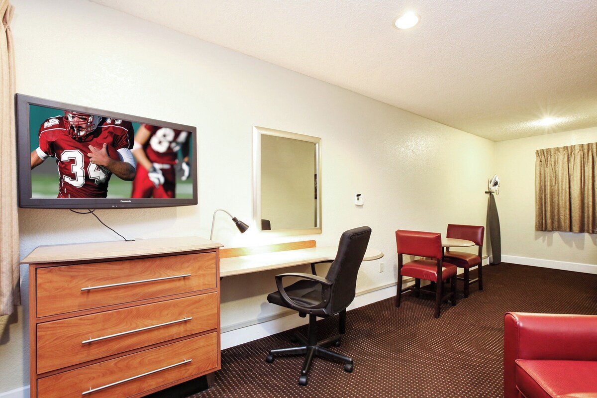 Suite, 1 King Bed, Non Smoking | Desk, laptop workspace, blackout drapes, cribs (free)