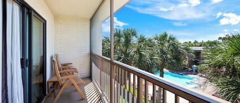 Suite, Multiple Beds, Kitchen, Poolside (Smoke Free) | Balcony view