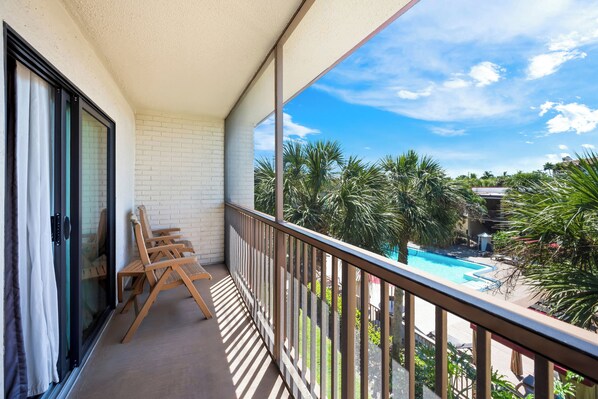 Suite, Multiple Beds, Kitchen, Poolside (Smoke Free) | Balcony view