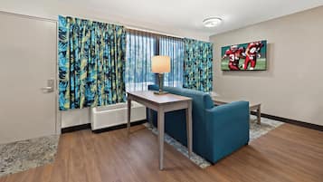 Desk, laptop workspace, blackout curtains, free WiFi