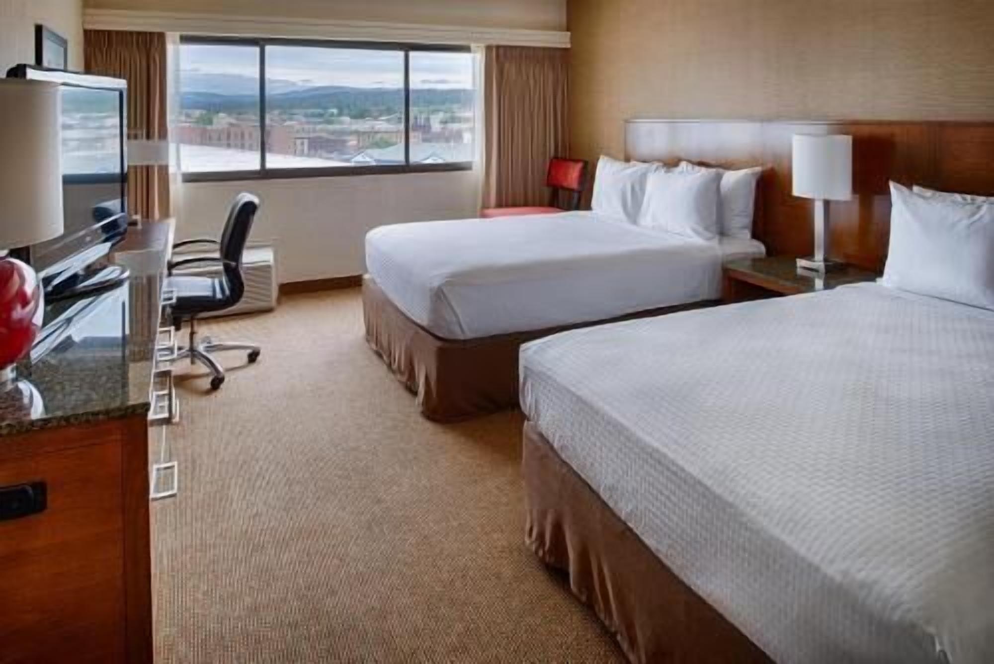 Premium bedding, down comforters, pillowtop beds, desk