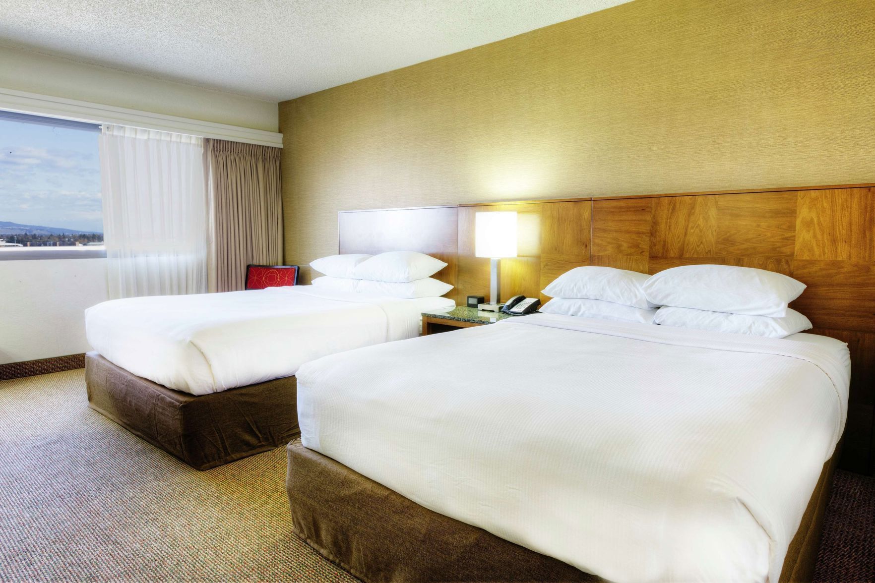 Premium bedding, down comforters, pillowtop beds, desk