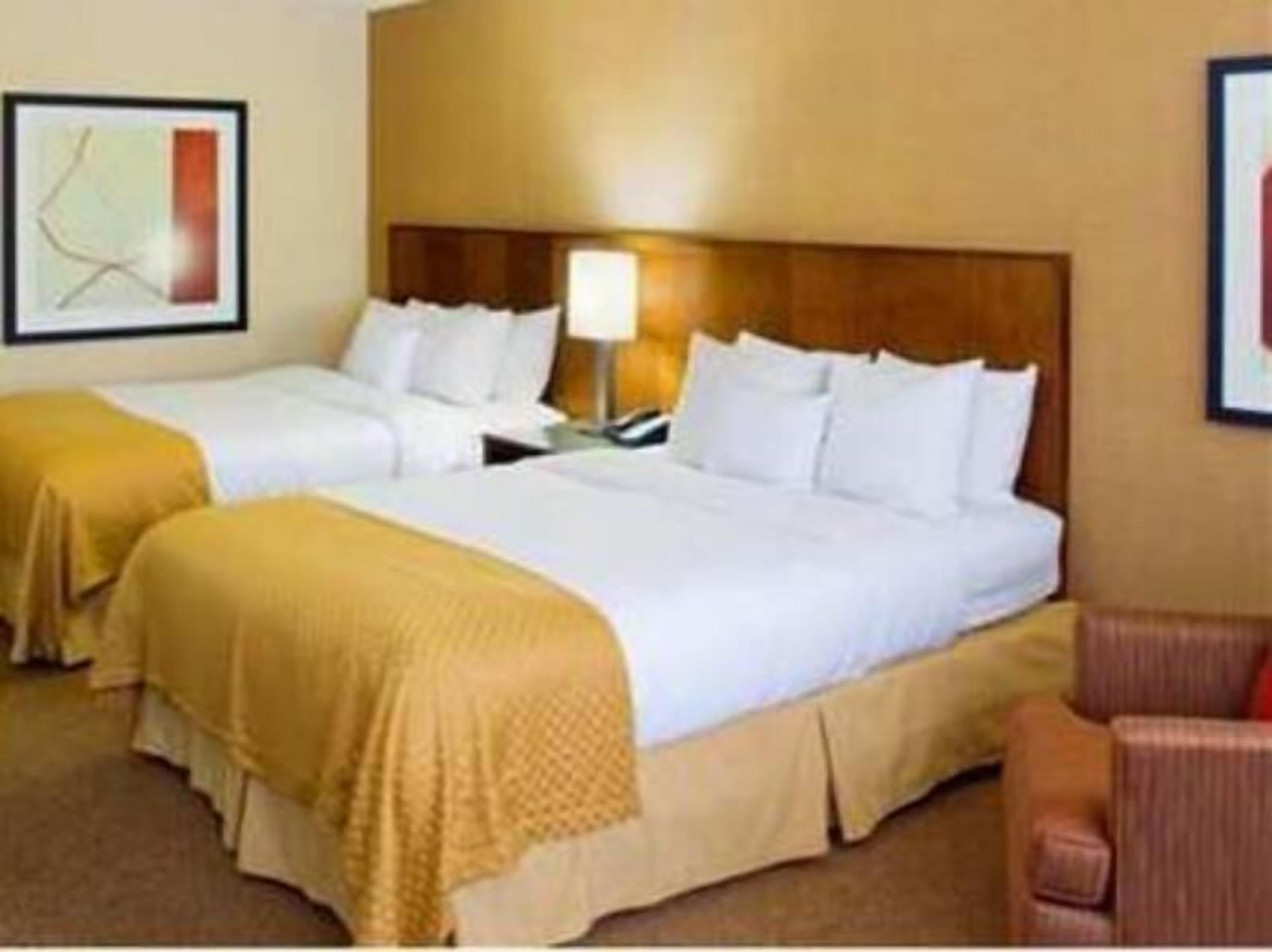 Premium bedding, down duvets, pillow-top beds, desk