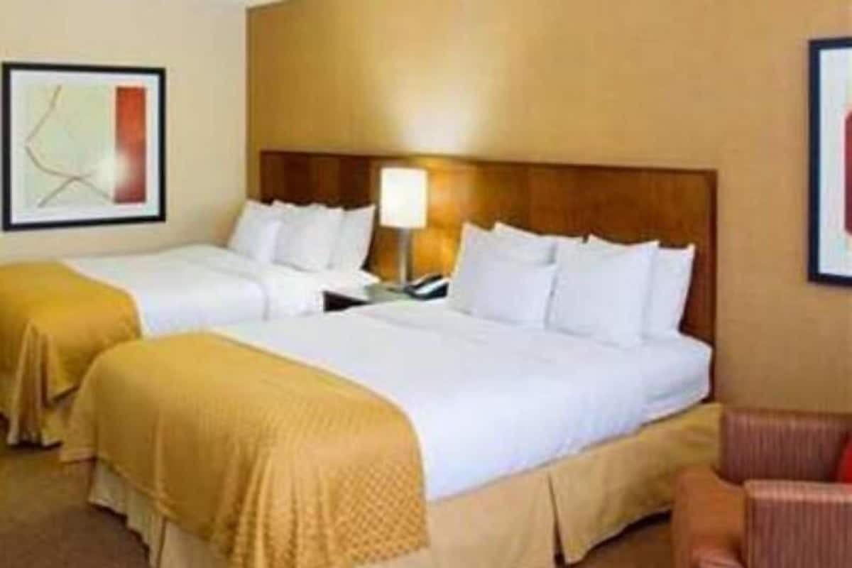 Premium bedding, down comforters, pillowtop beds, desk