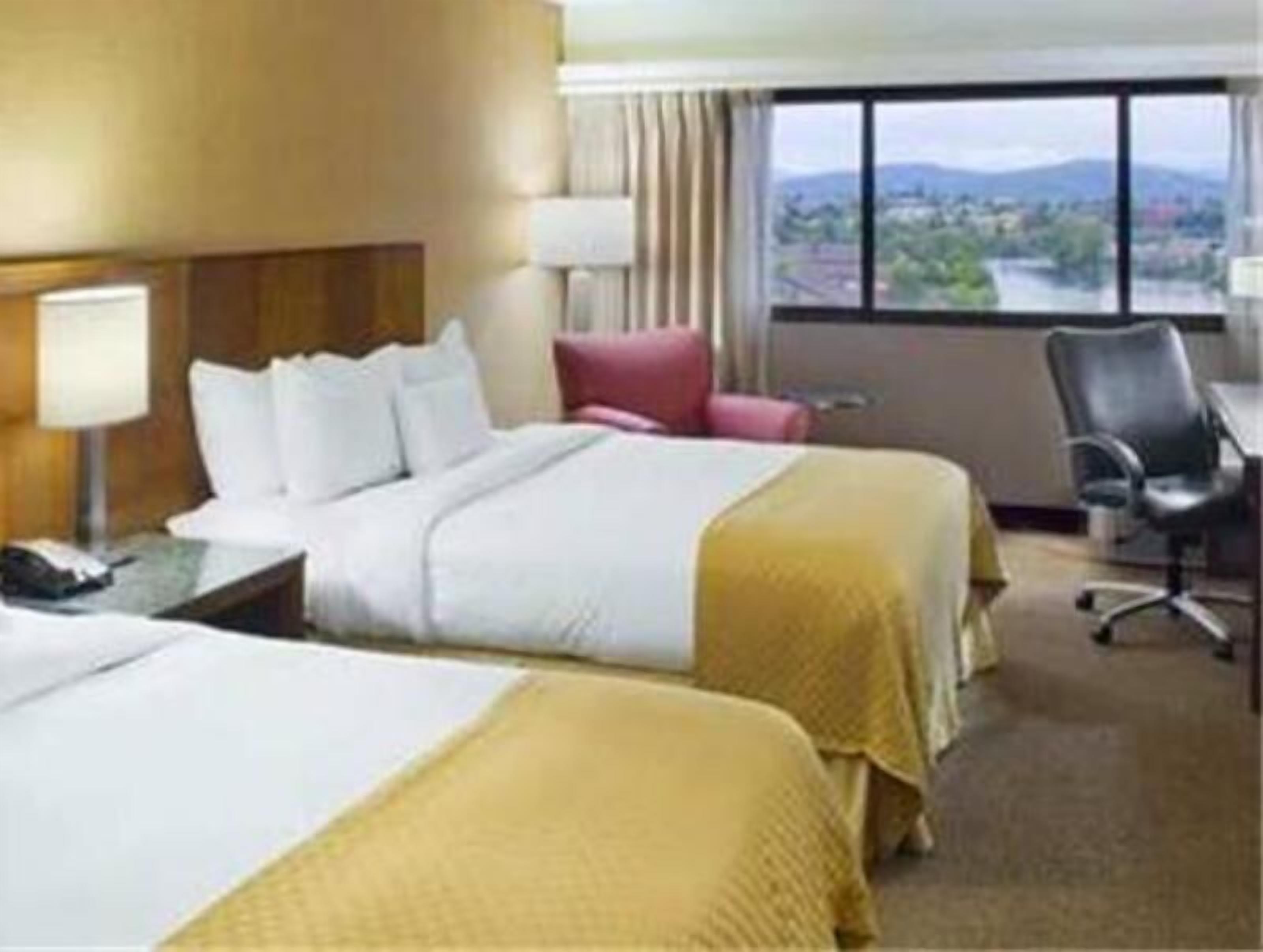 Premium bedding, down comforters, pillowtop beds, desk