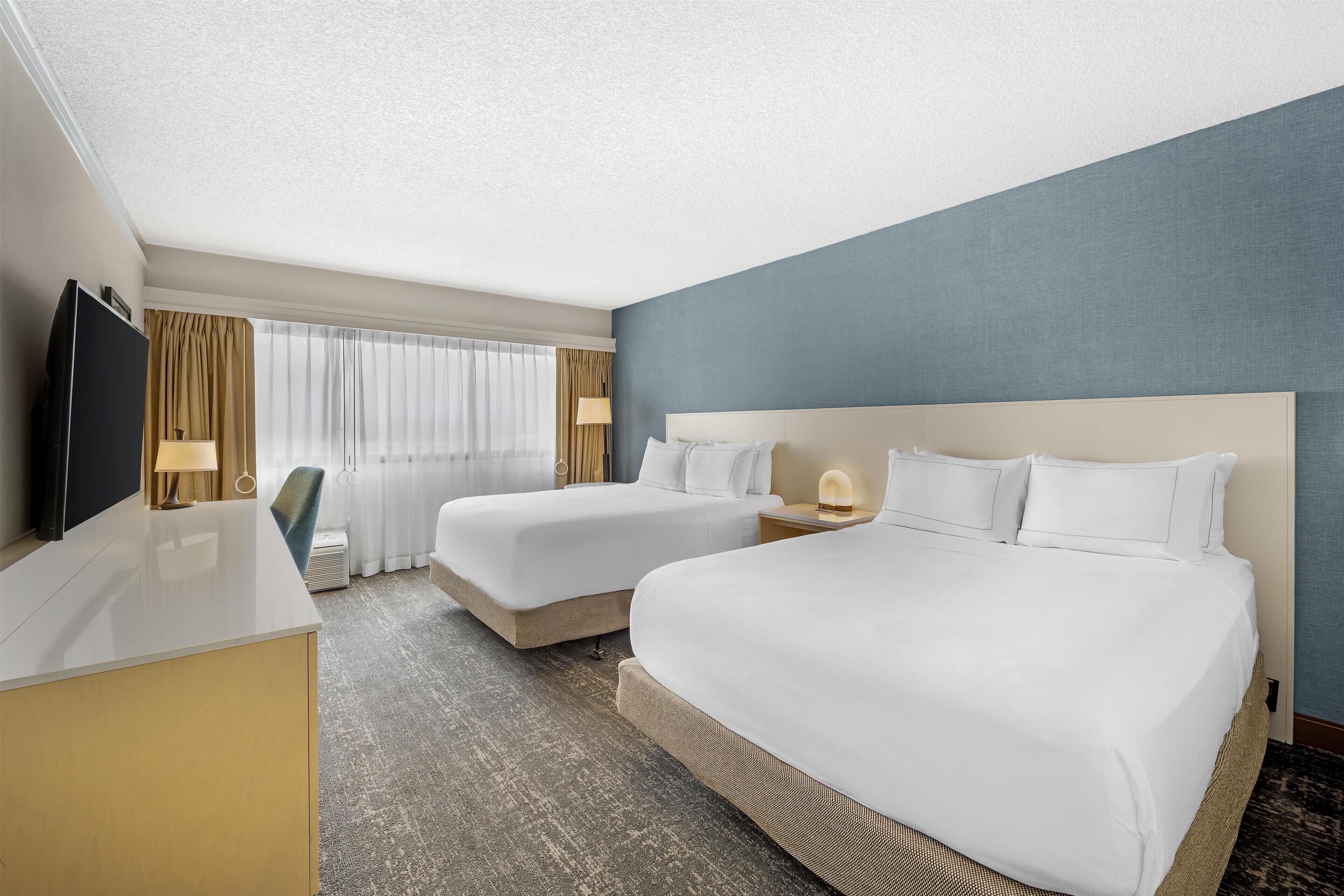 Premium bedding, down duvets, pillow-top beds, desk