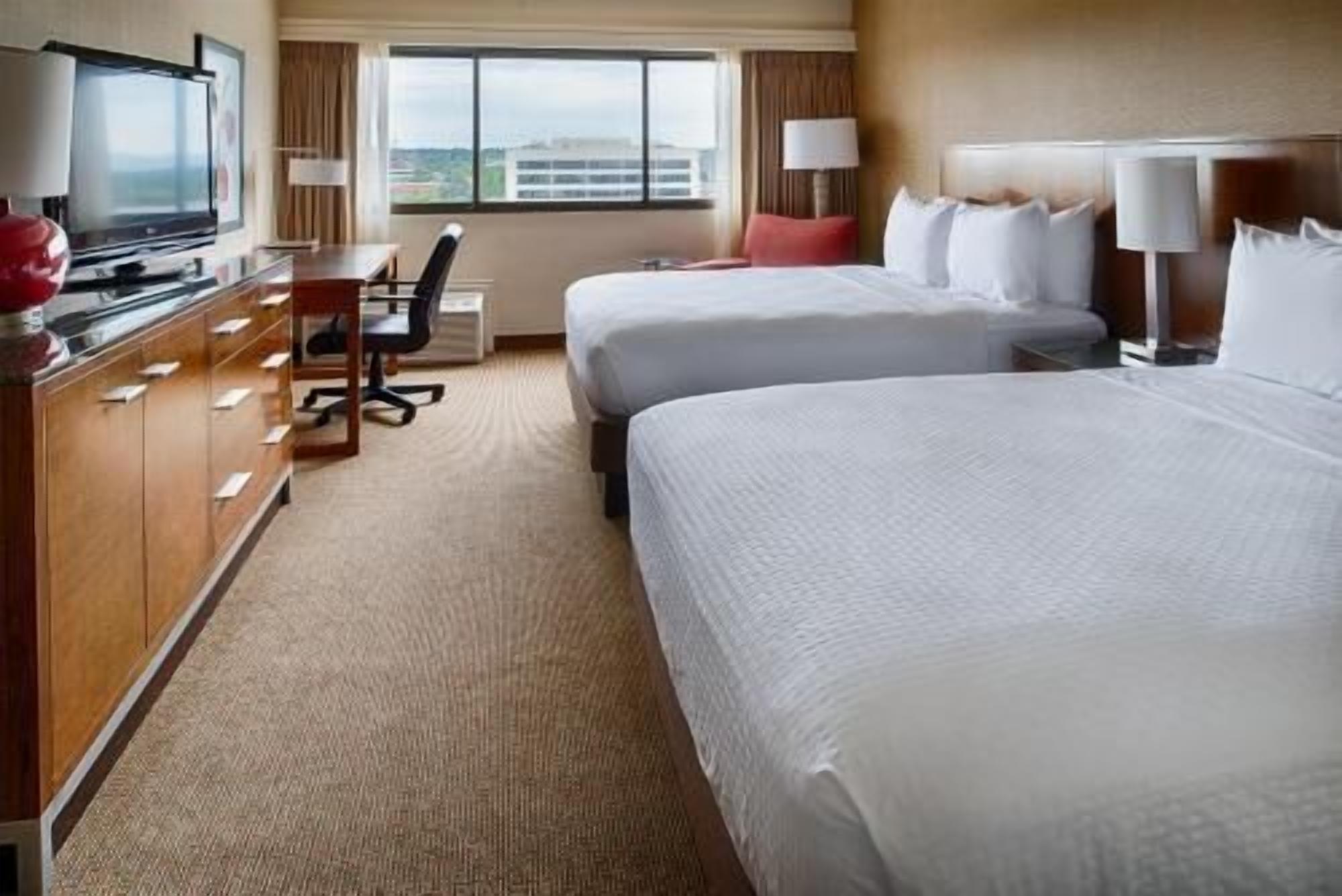 Premium bedding, down comforters, pillowtop beds, desk