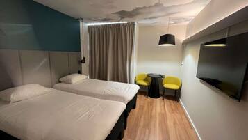 Standard Room, 2 Twin Beds | Desk, soundproofing, iron/ironing board, free WiFi