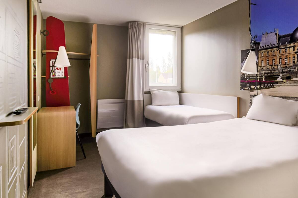 Standard Double Room, Multiple Beds | In-room safe, desk, soundproofing, iron/ironing board