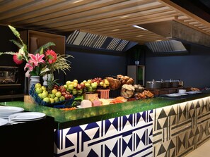 A buffet counter with various fruits, vegetables, and breads. - ibis Styles Abidjan Plateau (Abidjan)