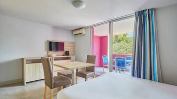 Family Studio | Living area | Flat-screen TV