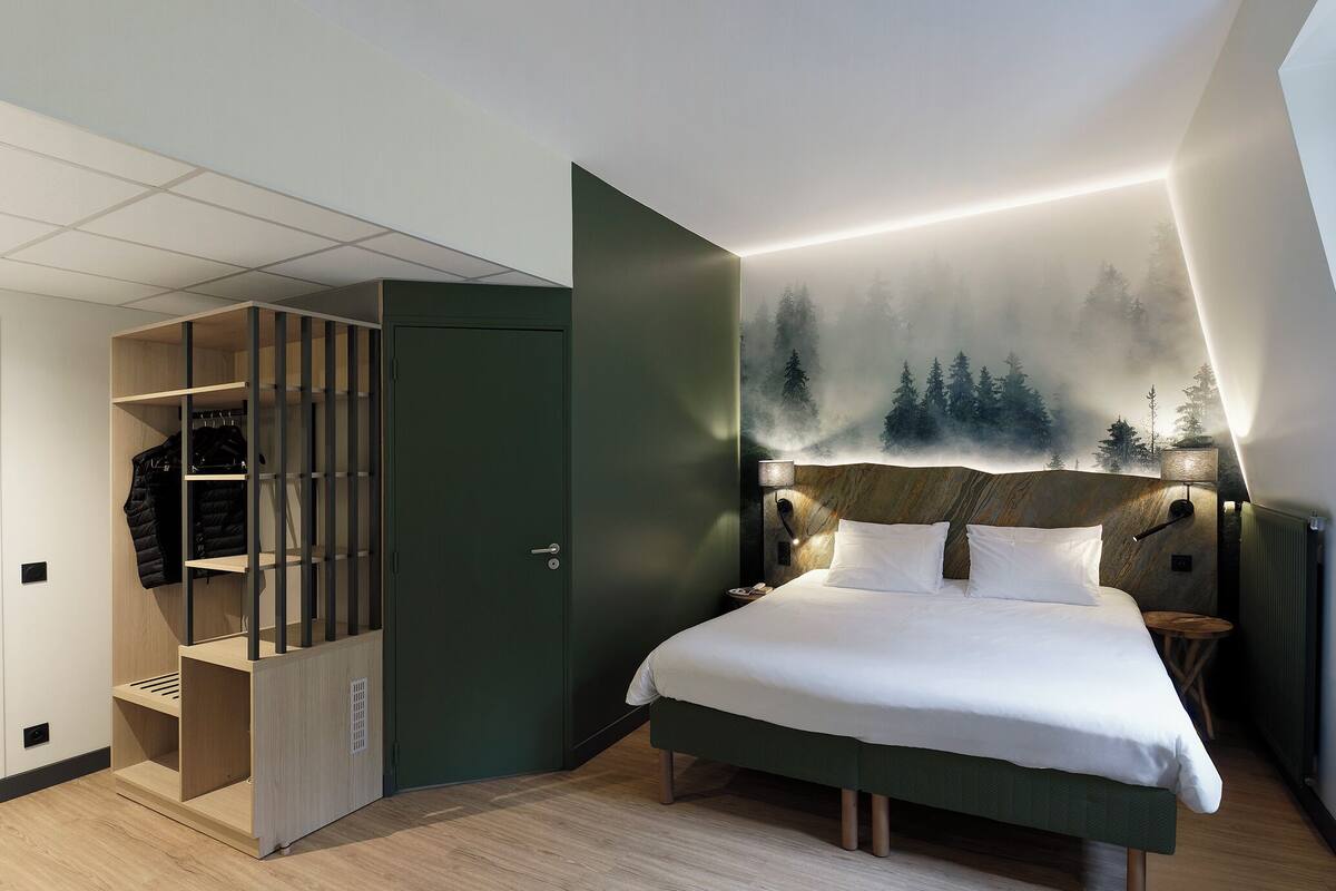Premium bedding, laptop workspace, blackout drapes