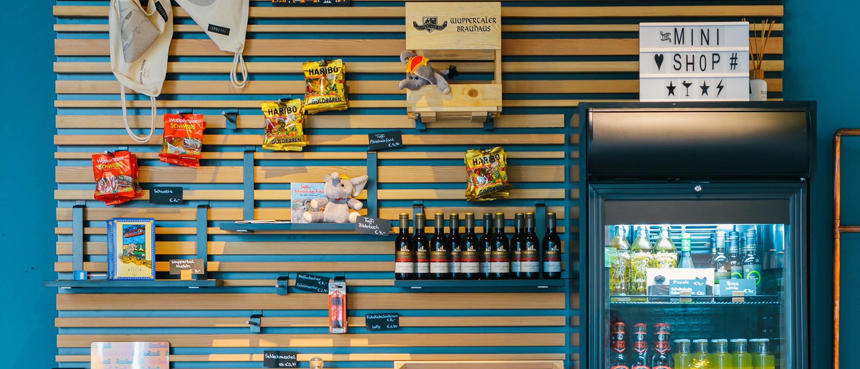 A snack and beverage display with various snacks and bottled drinks.