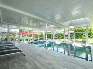 Indoor pool, open 8:00 AM to 10:00 PM, pool umbrellas, sun loungers