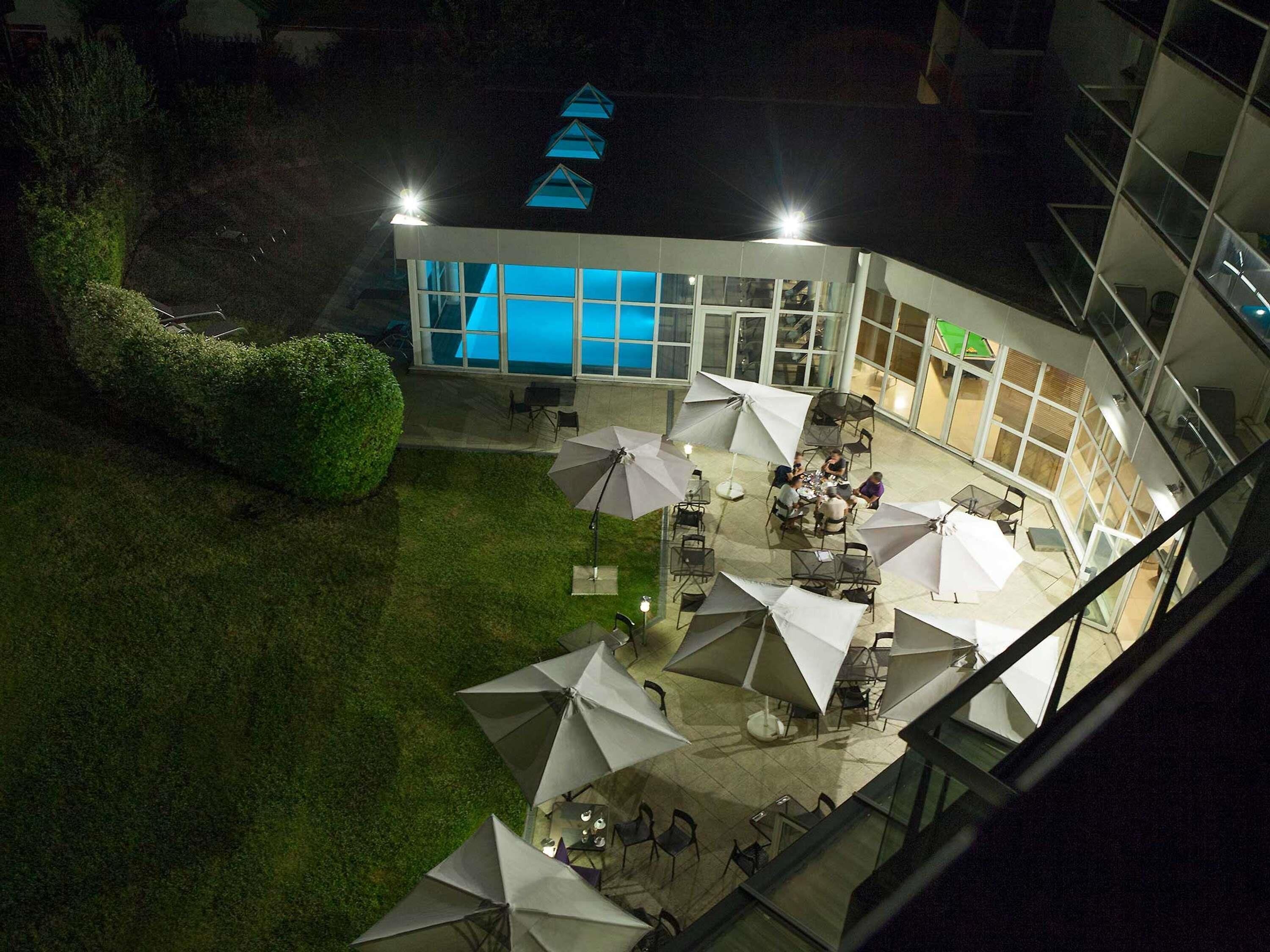 Indoor pool, open 8:00 AM to 10:00 PM, pool umbrellas, sun loungers