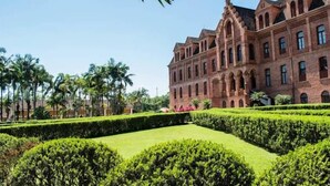 A large, historic building with multiple arched windows and a symmetrical facade. - Serra Alta Hotel (Sao Bento do Sul)