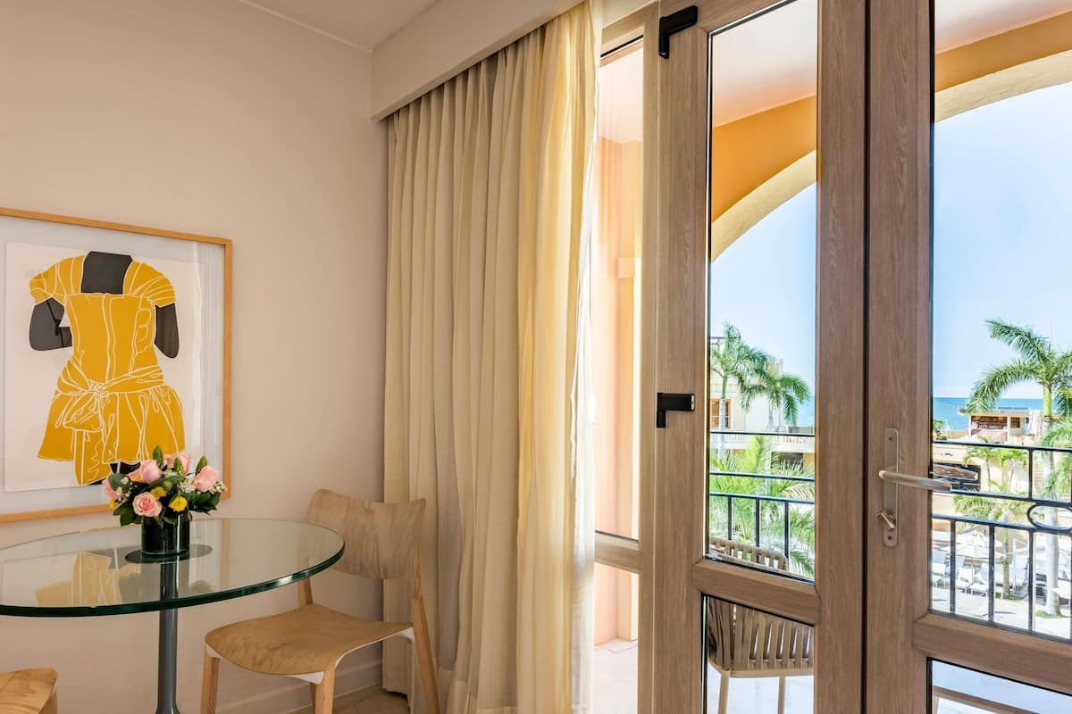 Premium bedding, down comforters, minibar, in-room safe