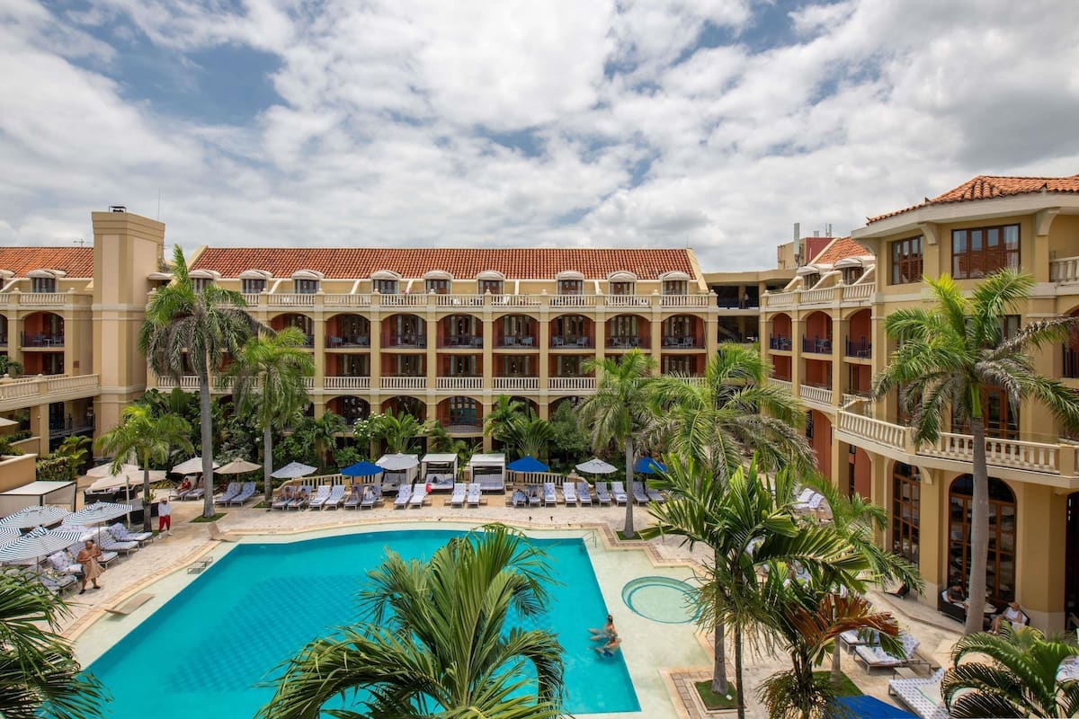 Superior Room, 1 King Bed, Balcony, Pool View | Premium bedding, down comforters, minibar, in-room safe