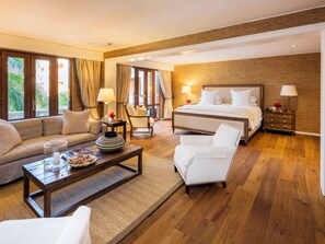 Premium bedding, down comforters, minibar, in-room safe