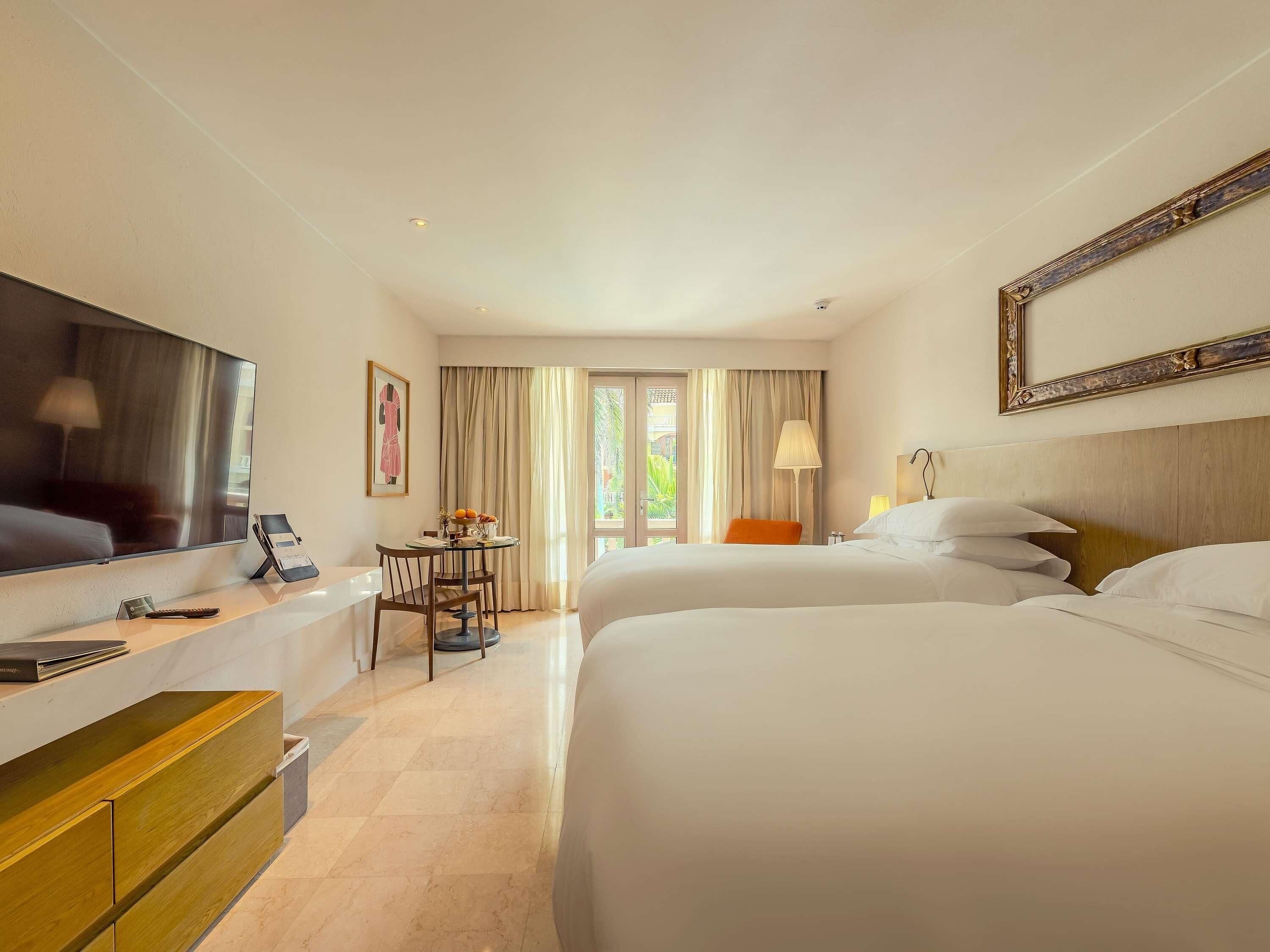 Hochwertige Bettwaren, Daunenbettdecken, Minibar, Zimmersafe