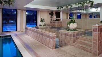 Indoor pool, outdoor pool, pool umbrellas, pool loungers