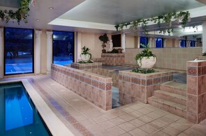Indoor pool, outdoor pool, pool umbrellas, pool loungers