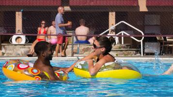 Indoor pool, seasonal outdoor pool, pool umbrellas, pool loungers