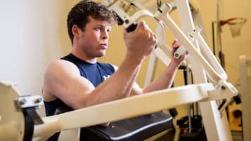 A person using a gym machine.