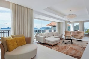 Suite, 2 Bedrooms | Living room | 42-inch LED TV with satellite channels, TV