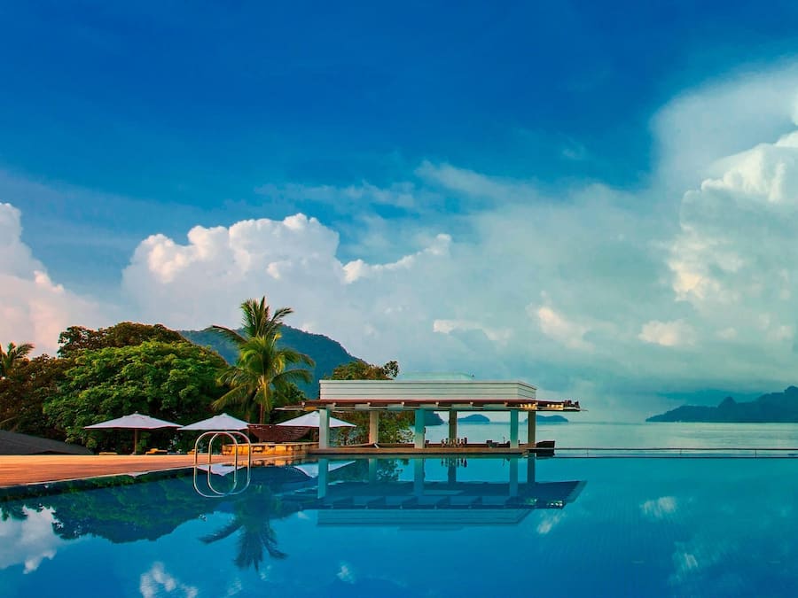 4 outdoor pools, open 7:00 AM to 8:00 PM, pool umbrellas, sun loungers