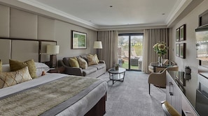 Junior Suite, 1 King Bed, Garden View | Premium bedding, in-room safe, desk, laptop workspace