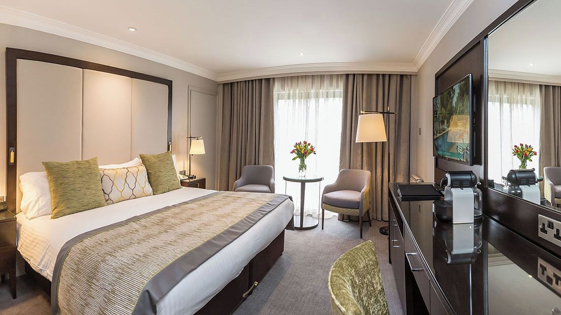 deluxe double room, garden view | 1 bedroom, premium bedding, in-room safe, desk