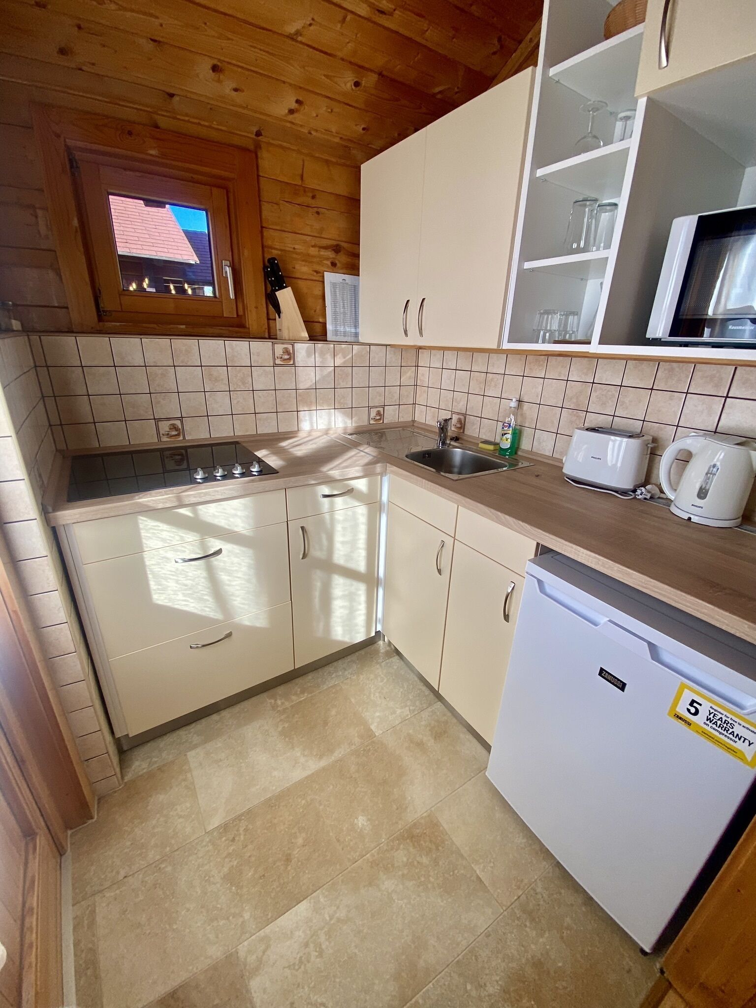 superior 1-bedroom chalet with sauna | private kitchen | fridge, microwave, stovetop, coffee/tea maker