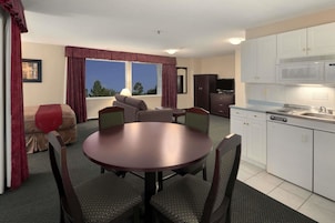 Desk, iron/ironing board, cribs (free), WiFi (free)