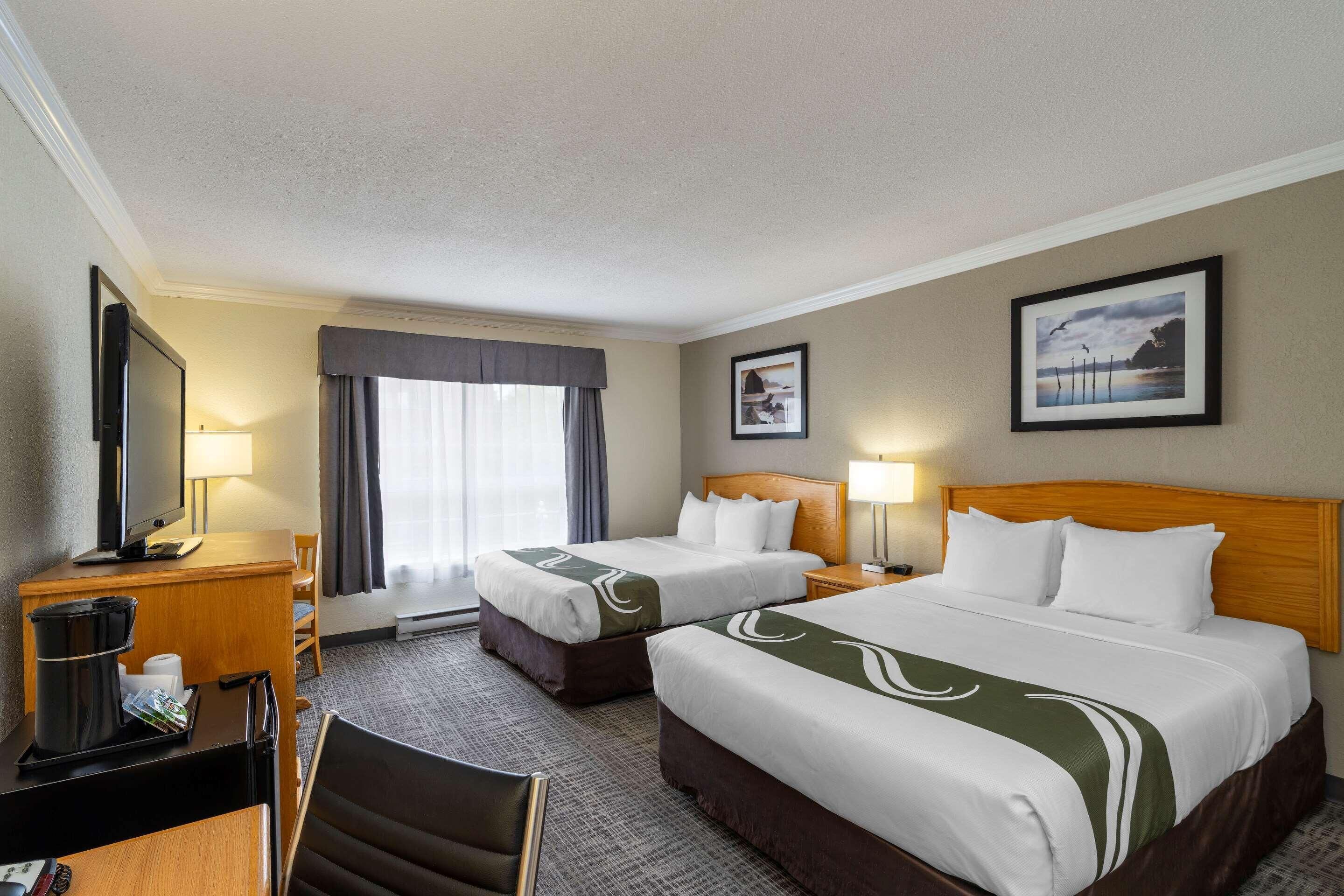 Pillow-top beds, desk, blackout curtains, iron/ironing board