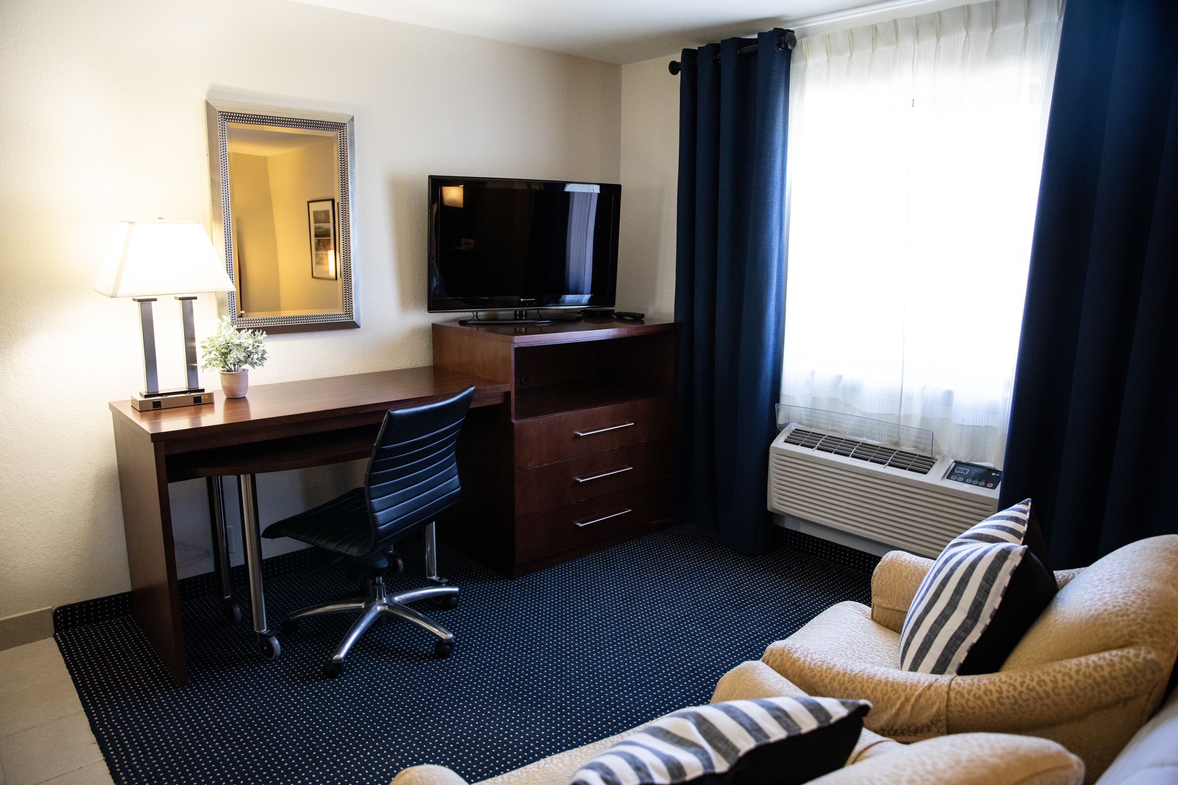 suite, 1 king bed, jetted tub | premium bedding, desk, laptop workspace, blackout curtains