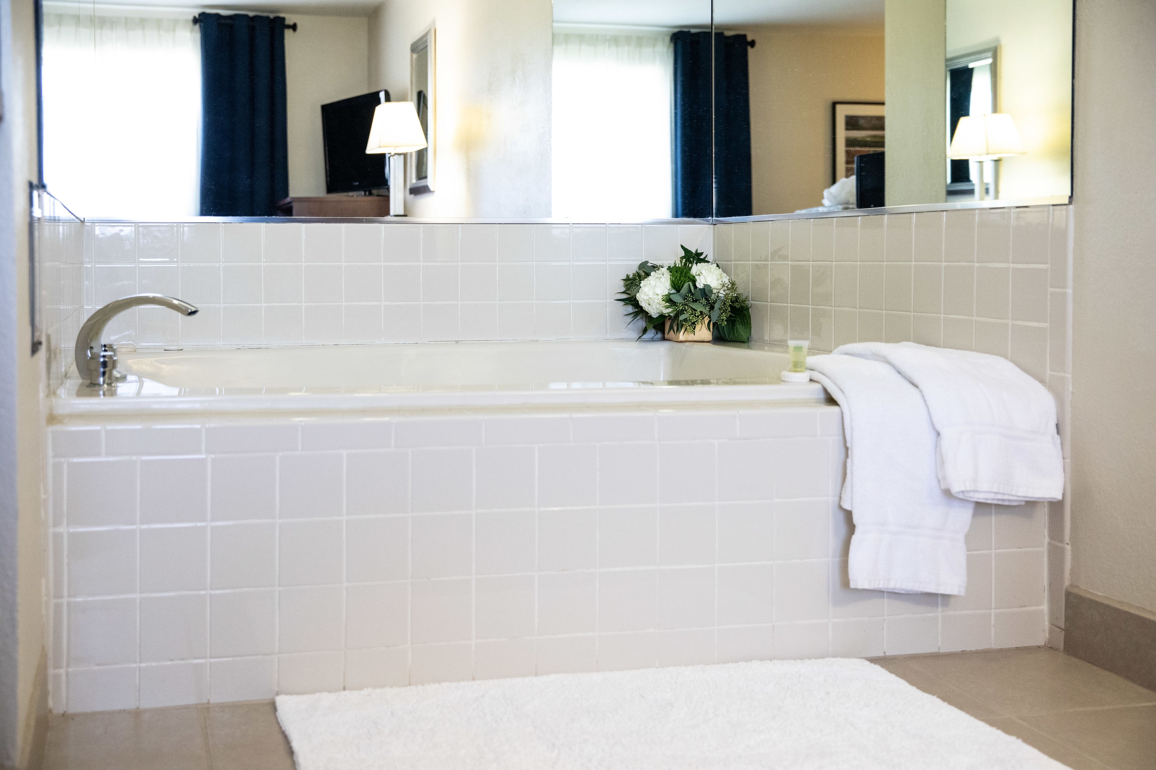 suite, 1 king bed, jetted tub | premium bedding, desk, laptop workspace, blackout curtains