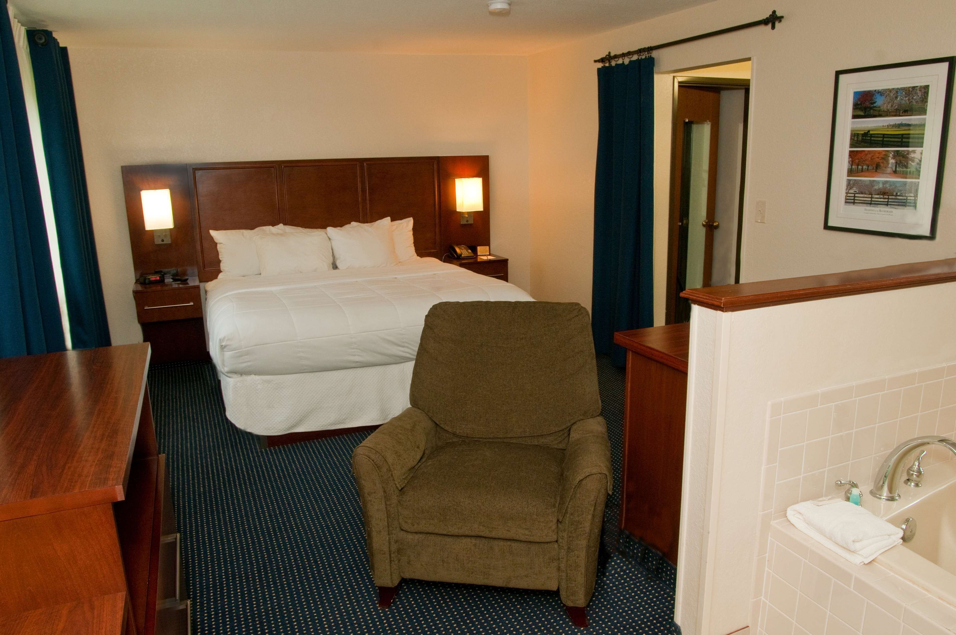 premium bedding, desk, laptop workspace, blackout curtains