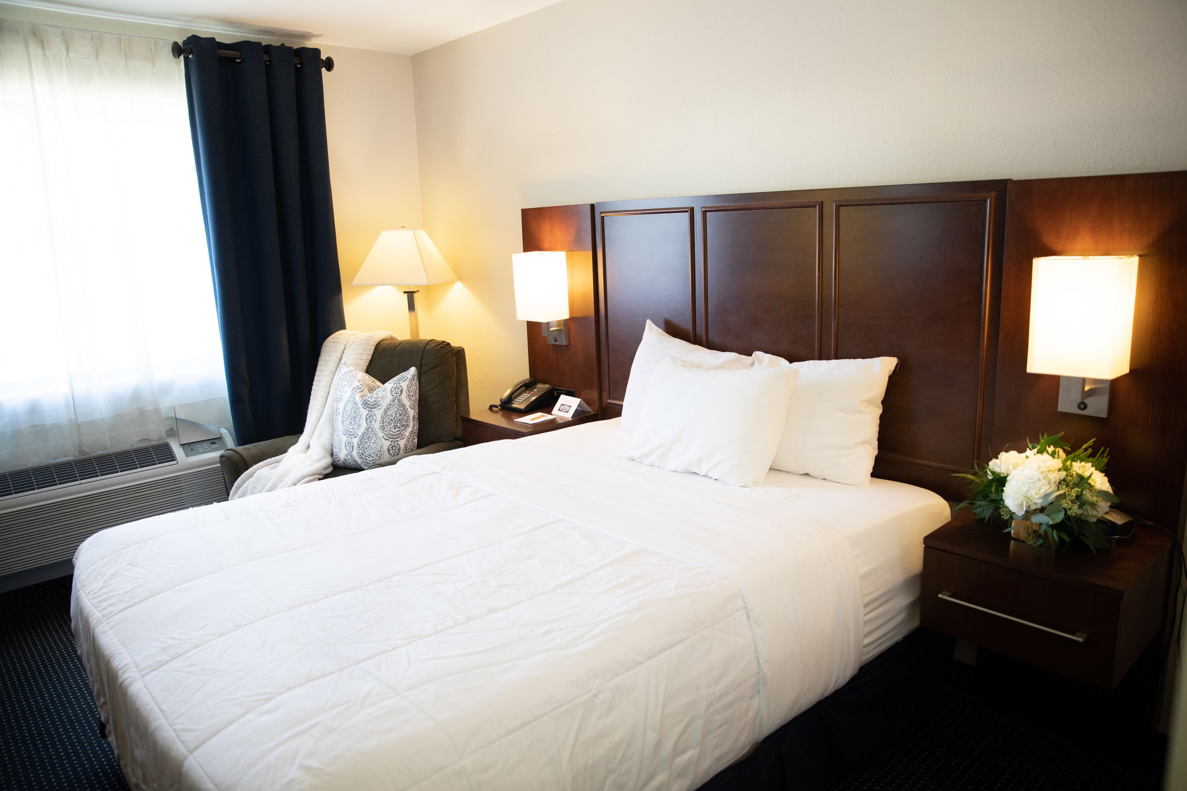 single room, 1 queen bed, refrigerator & microwave | premium bedding, desk, laptop workspace, blackout curtains