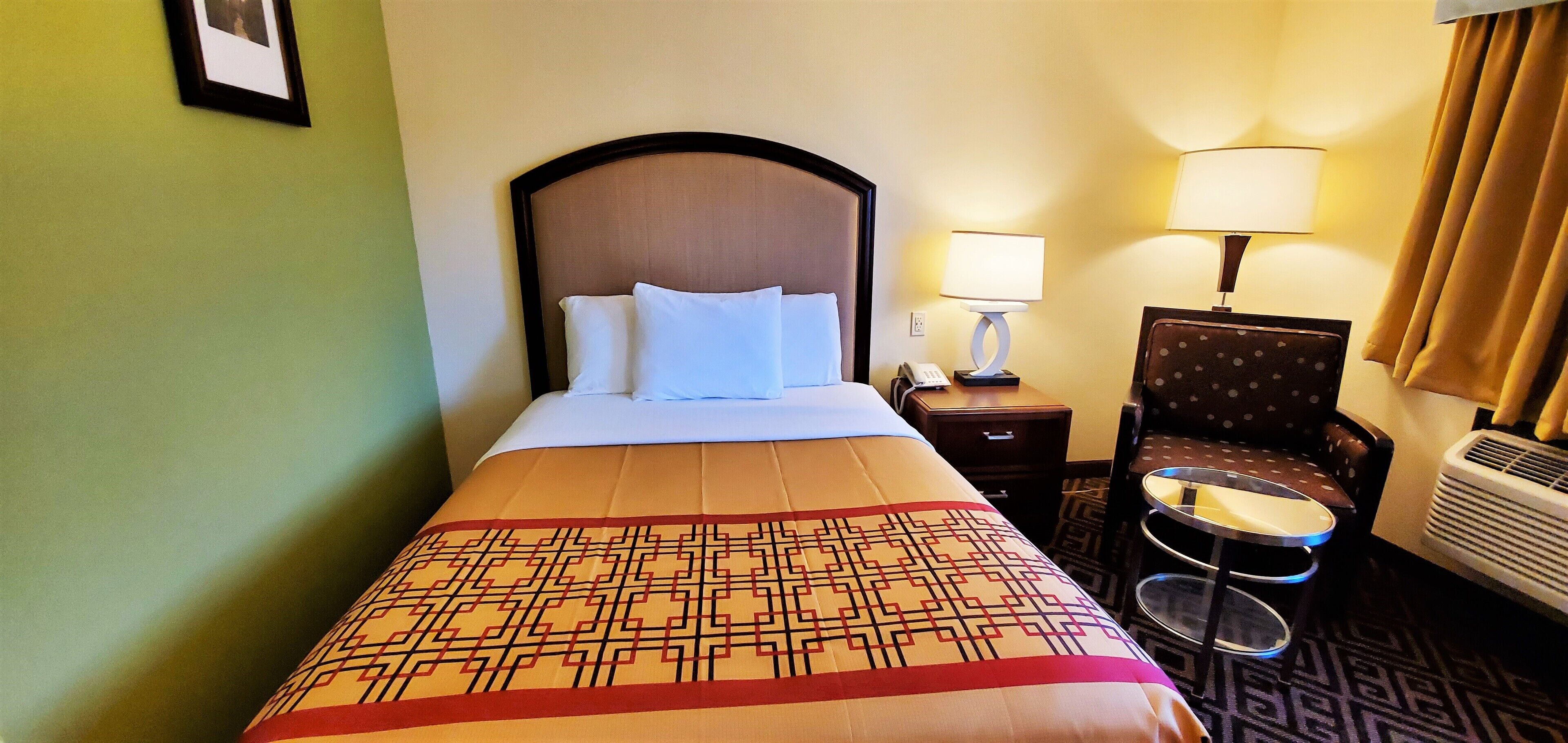 individually decorated, individually furnished, desk, blackout curtains