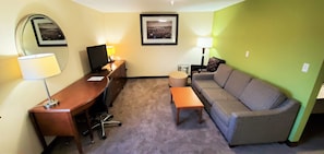 Suite, 1 King Bed with Sofa bed, Non Smoking | Living area | TV