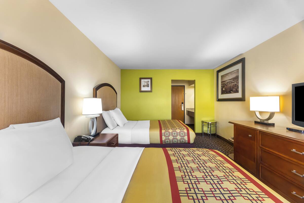 Room, 2 Queen Beds, Non Smoking | Desk, blackout drapes, iron/ironing board (on request), WiFi (free)
