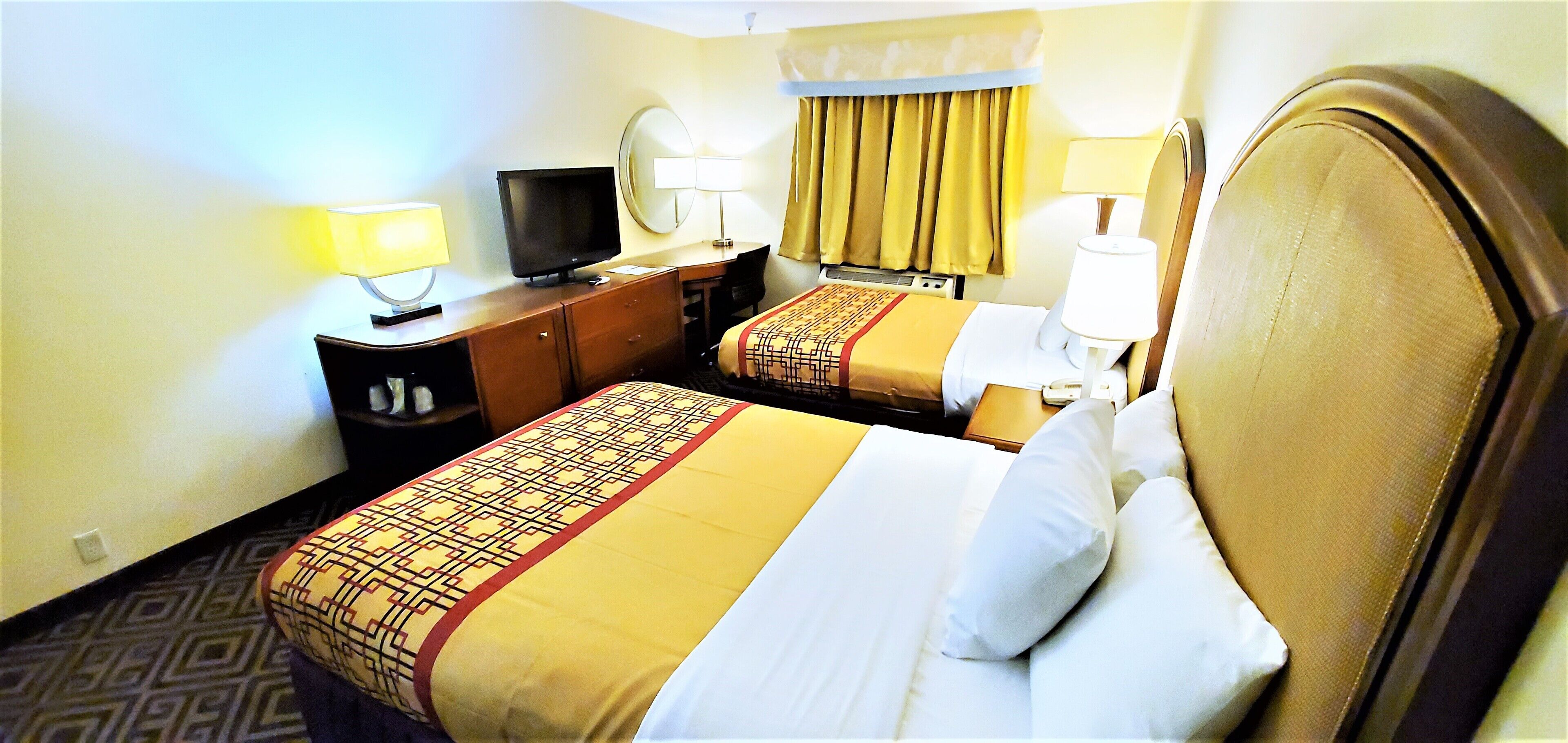 room, 2 queen beds, non smoking | individually decorated, individually furnished, desk, blackout curtains